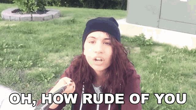 a girl taking a selfie with the words oh how rude of you above her