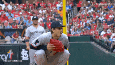 two minnesota baseball players are on the field