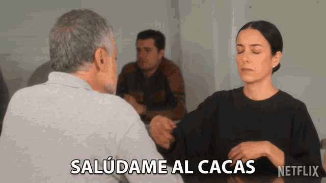 a netflix ad shows a woman talking to a man and says " saludame al cacas "