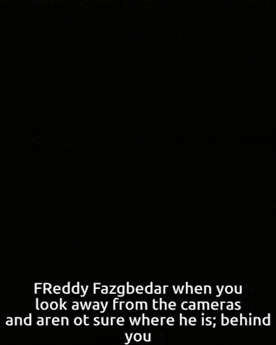 a man in a suit and tie stands in the dark with a caption that says freddy fazgbedar