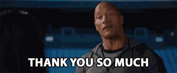 a man is saying thank you so much in front of a crowd