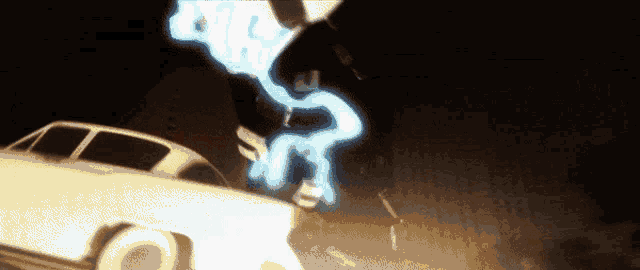a white car is driving down a street at night and a lightning bolt is coming out of it