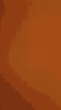 a blurry picture of a person 's face with a blue and brown background