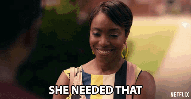 a woman is smiling and says she needed that on netflix