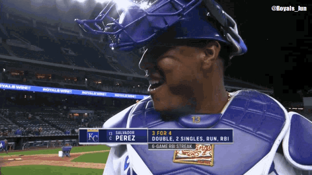 a baseball player named salvador perez is wearing a catcher 's chest guard