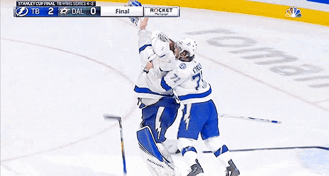 a hockey game between the lightning and dallas is underway