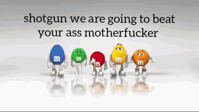 a group of m & m 's standing next to each other