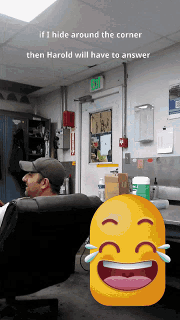 a man sits in a chair with a smiley face in front of him with tears coming out of his eyes