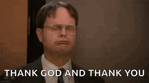 a man in a suit and tie is raising his arms in the air and saying thank god and thank you .