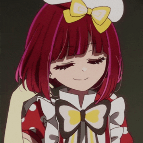 a red haired anime girl with a yellow bow on her head