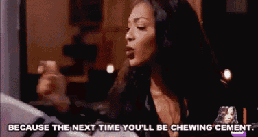 a woman is chewing on a piece of cement and says because the next time you 'll be chewing cement