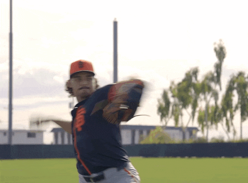 a baseball player wearing a hat that says ' a' on it