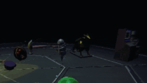 a video game scene with a yellow arcade machine and a green ball in the foreground