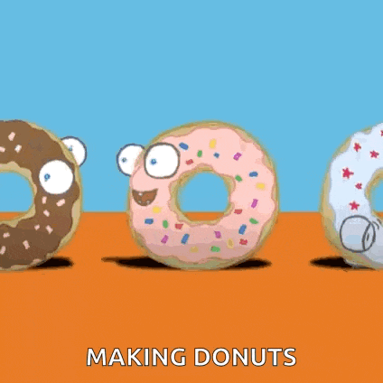 three donuts are standing next to each other on an orange surface with the words making donuts above them .