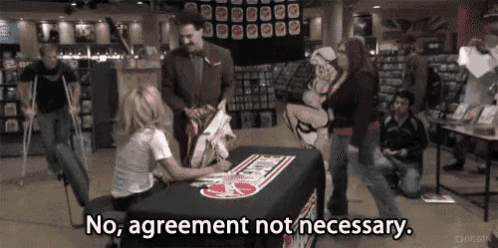 a group of people sitting around a table with the words " no agreement not necessary " written on it