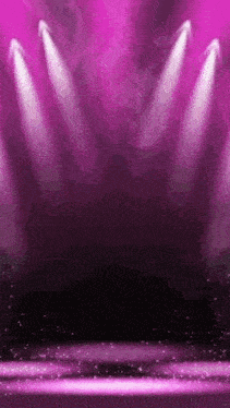 a purple stage with a lot of lights on it