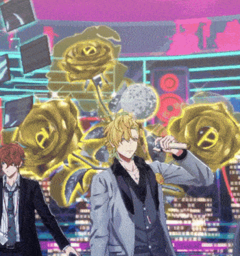 a man in a suit holds a microphone in front of a bunch of flowers with the letter p on them