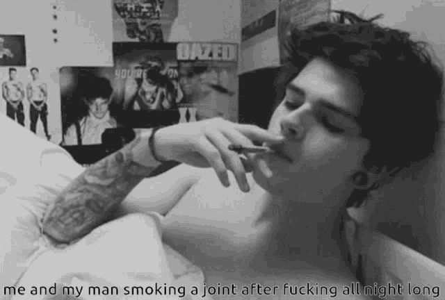 a shirtless man smoking a joint in a black and white photo with a caption that says me and my man