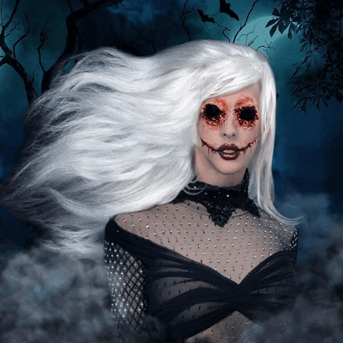 a woman with white hair and bloody eyes is in a dark forest