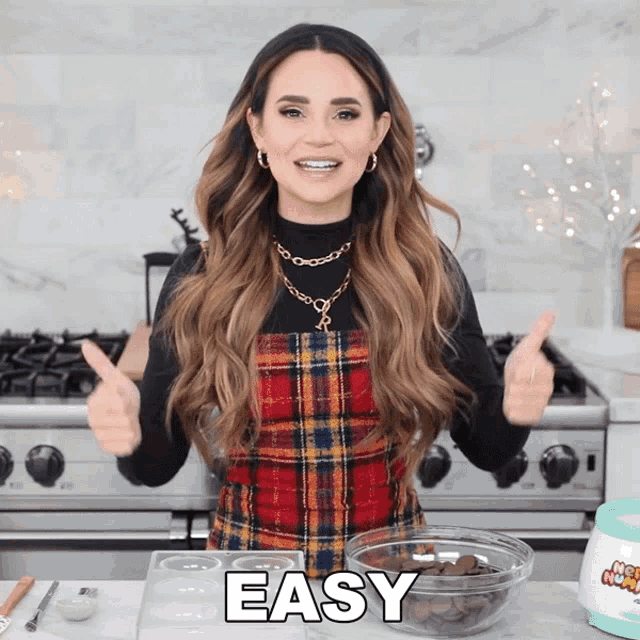 a woman giving a thumbs up next to a bowl of chocolate chips and the word easy
