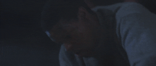 a close up of a man 's face with duct tape on it