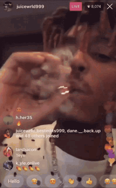 a screenshot of juice wrld smoking a cigarette