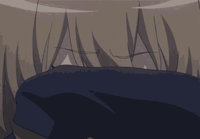 a close up of a girl with her eyes closed and her hand on her face