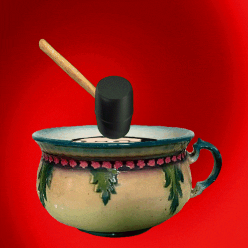 a cartoon of a man in a teacup with a hammer on his head