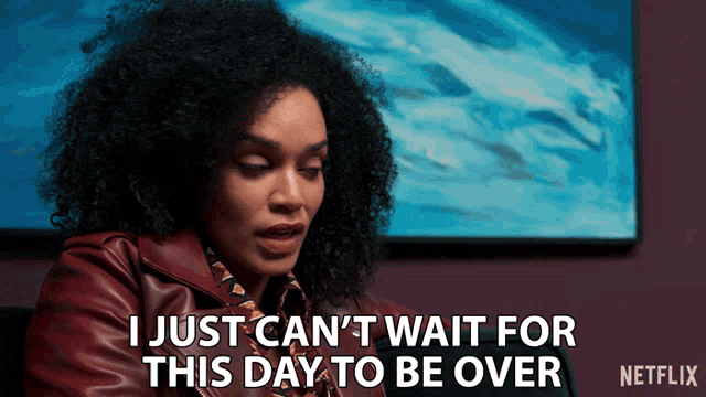 a woman with curly hair says i just can t wait for this day to be over
