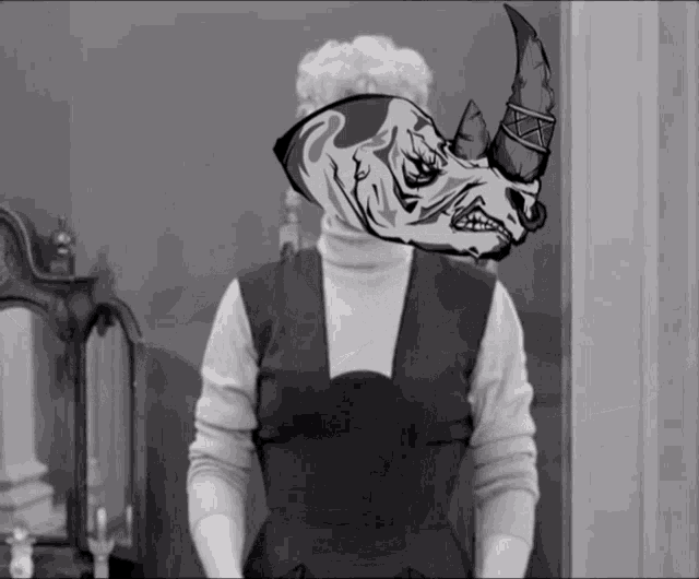 a black and white drawing of a woman with a rhino head on her face