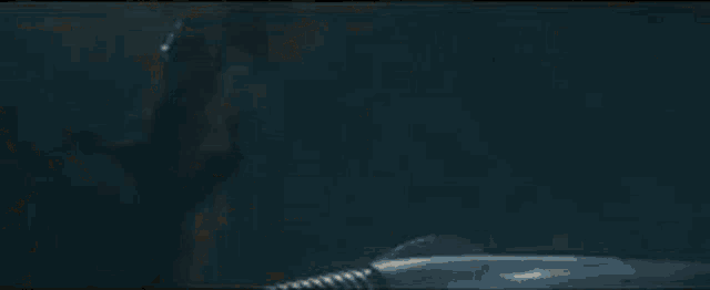 a group of people are standing next to each other in a room in a building .