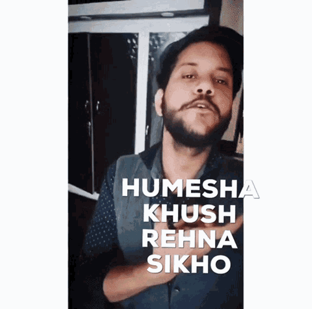 a man with a beard says humesha khush rehna sikho on a white background