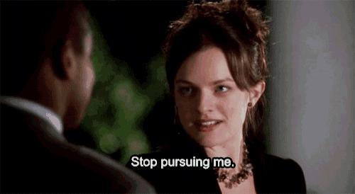 a woman is talking to a man and says `` stop pursuing me . ''