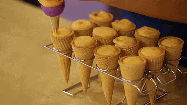 Torch Cake Cones Winter Olympics GIF - Torch Cake Cones Winter Olympics Olympics GIFs