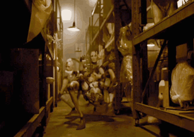 a warehouse filled with lots of dolls including one with a face on it