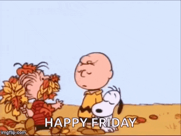 charlie brown and snoopy are sitting in a pile of leaves with a happy friday message .
