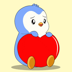 a penguin is holding a red heart in its hands