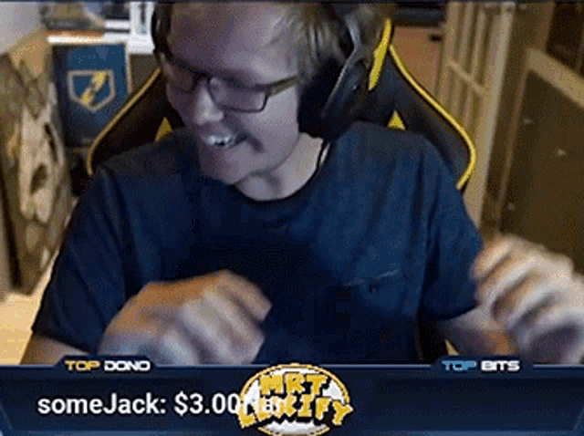 a man wearing glasses and headphones is sitting in front of a screen that says somejack $ 3.00