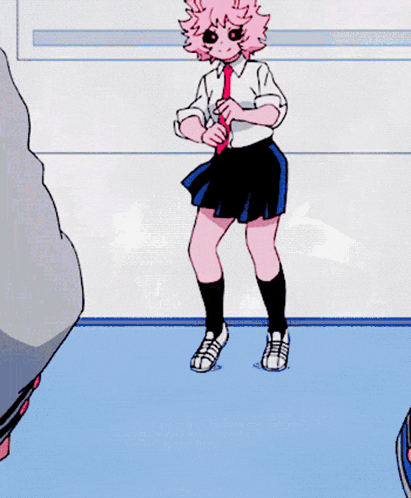 a girl in a school uniform is doing a handstand on her head