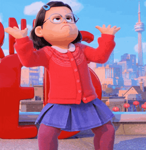 a little girl in a red sweater and blue skirt is standing in front of a large red letter n