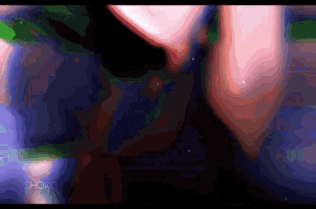 a blurry picture of a person with the word shock on the bottom right