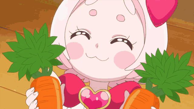 a cartoon character with a heart on her chest is holding two carrots