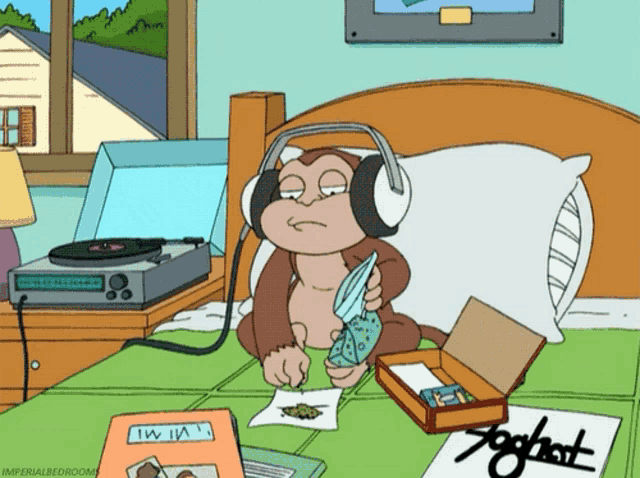 a cartoon of a monkey wearing headphones sitting on a bed next to a record player