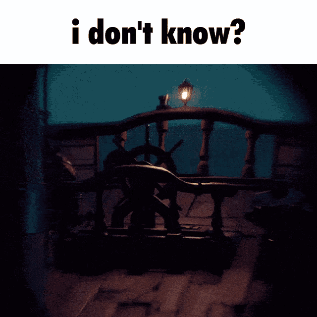 a dark room with a steering wheel and the words " i don 't know " above it