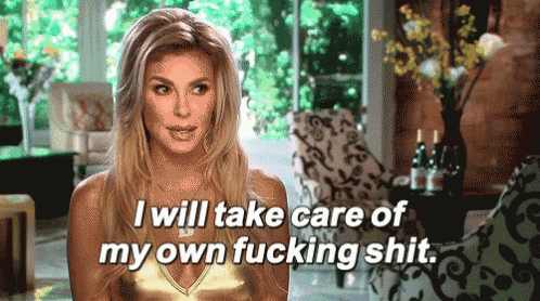 a woman says " i will take care of my own fucking shit " while sitting in a living room
