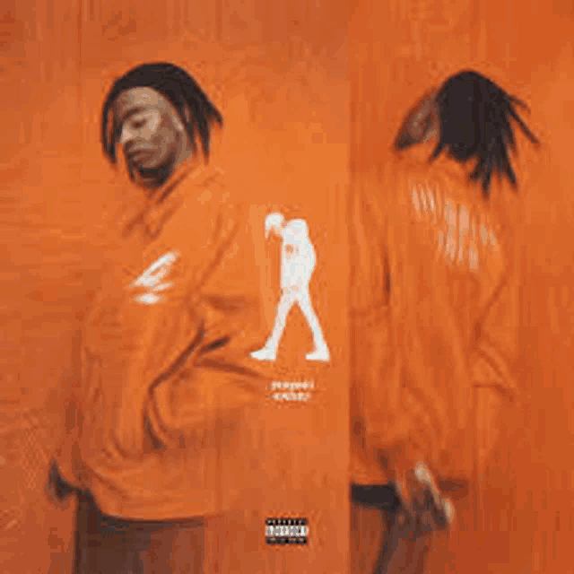 a man wearing an orange hoodie with a silhouette of a man on the back .