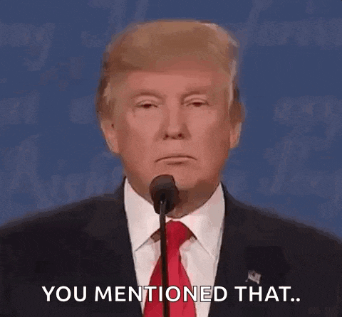 donald trump is giving a speech in front of a microphone and says `` you mentioned that '' .