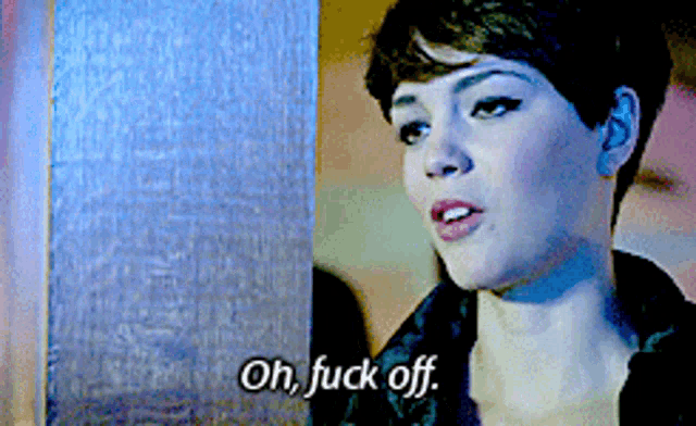 a woman says oh fuck off in front of a blue background