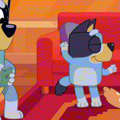 a cartoon dog is standing in front of a red couch while another dog holds a book .