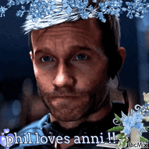 a picture of a man with flowers and the words phil loves anni